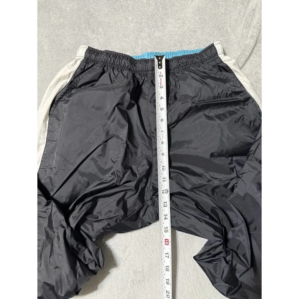 VTG Nike Mens XL Track Pants Windbreaker Black Nylon Ankle Zip Running